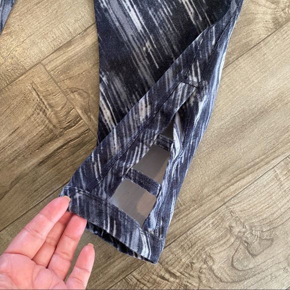 Xersion multi-colored athletic Capri leggings with cut out detail on leg… - Picture 2 of 6